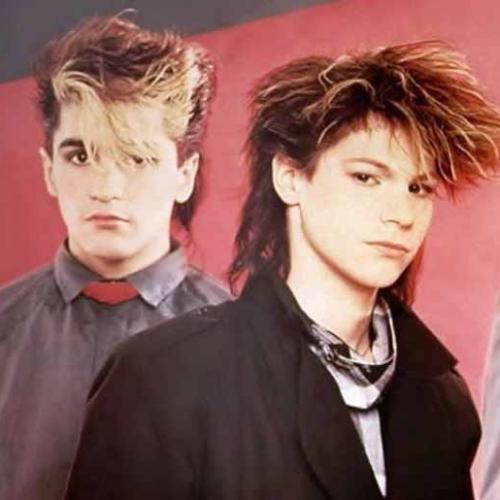 Pseudo Echo's Brian Canham On How Bass Player 'Pierre Pierre' Got His Name