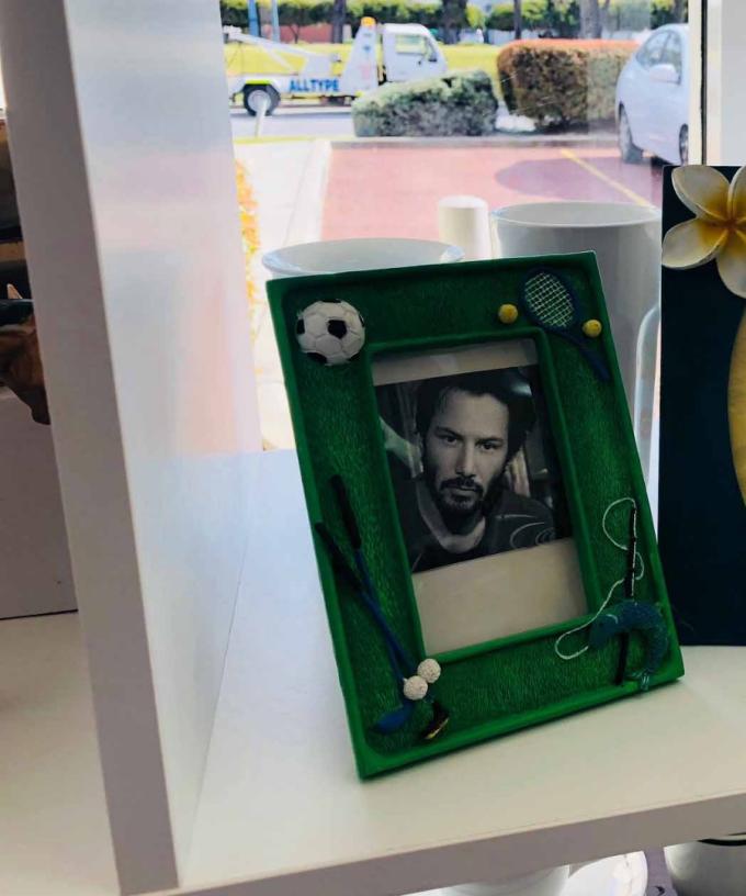 Perth Op Shop Has Keanu Reeves In All Its Picture Frames