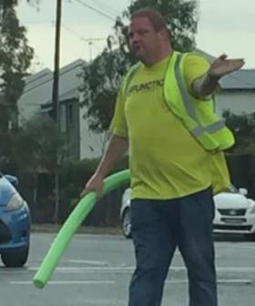 Local Legend Uses Pool Noodle To Direct Traffic During Blackout