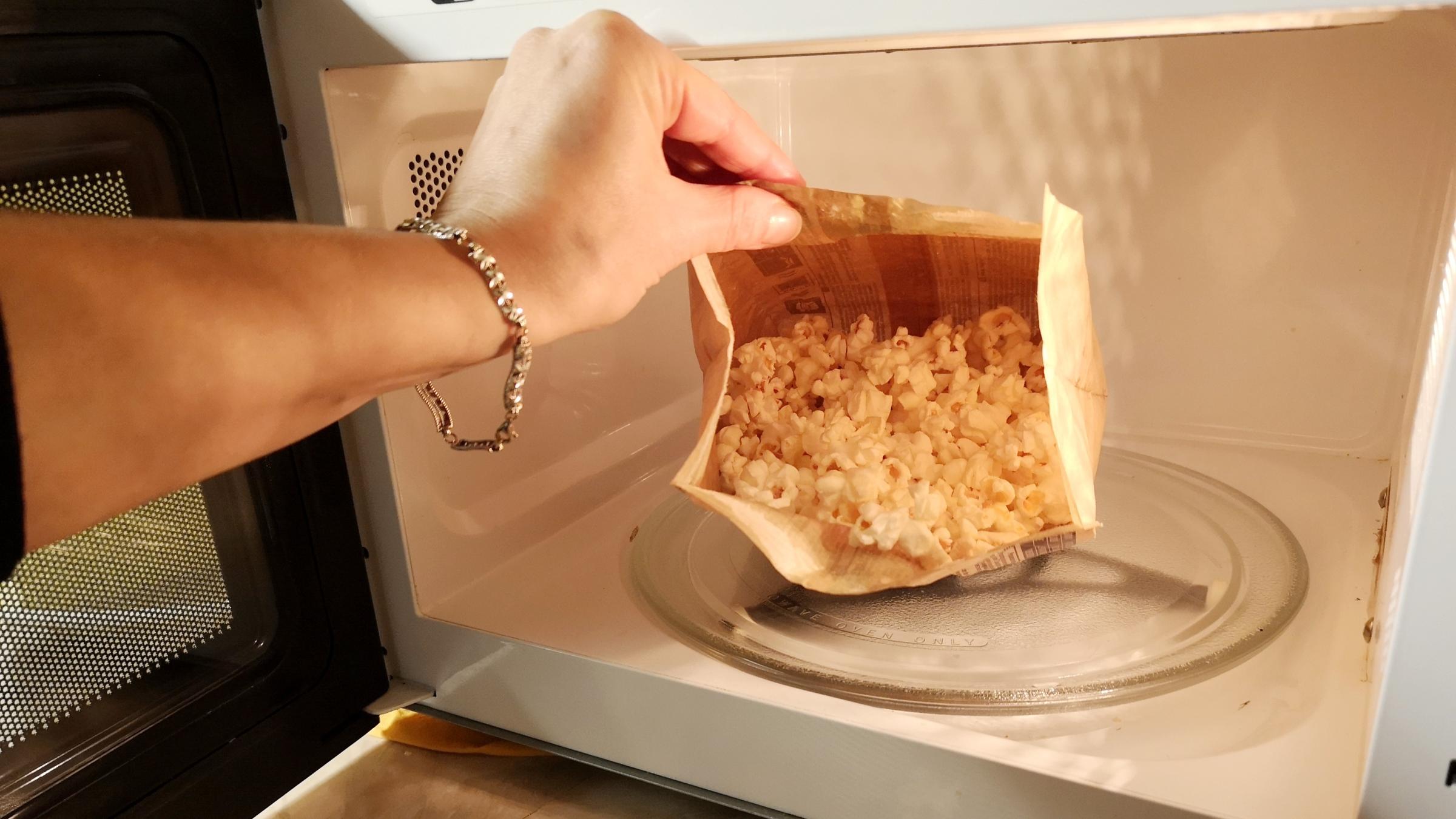 We've Been Heating Up Microwave Popcorn Wrong This Whole Time