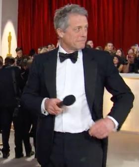 Ooof, Hugh Grant's Awkward Red Carpet Interview Is A Hard Watch