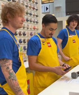 Ed Sheeran Gets Meta, Performs 'Lego House' While Working At Lego Store